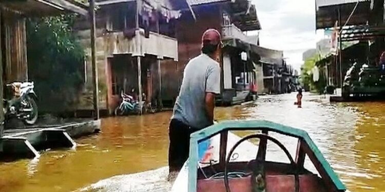 Banjir yang merendam di salah satu desa Kecamatan Mandau Talawang, Kabupaten Kapuas, Kalimantan Tengah, beberapa hari lalu. (ANT/IST)