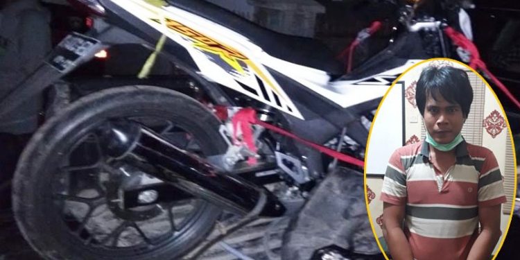 Pelaku tindak pidana penggelapan Aditia alias Rambo bin Jarkani (kanan) saat diamankan di Mapolres Barito Utara beserta barang buktinya beberapa waktu lalu. ANTARA/Dokumentasi Pribadi