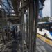 Sejumlah petugas membersihkan puing Halte Bus Trans-Jakarta Tosari yang hangus saat kericuhan unjuk rasa menolak pengesahan Undang-Undang Cipta Kerja di Jalan MH. Thamrin, Jakarta, Jumat (9/10/2020). Sejumlah fasilitas umum rusak dalam kericuhan yang terjadi Kamis (8/10). (ANT)
