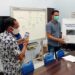 Ketua KPU Gumas Stepenson disaksikan Ketua Bawaslu Gumas Walman Tristianto, Kabagops Polres Gumas AKP Aries Nugroho, Kasat Intelkam Polres Gumas AKP Tri Prasetyo, dan lainnya saat menyerahkan dokumen hasil pleno kepada KPU Kalteng, di Palangka Raya, Selasa (15/12/2020). (Foto : Polres Gumas)
