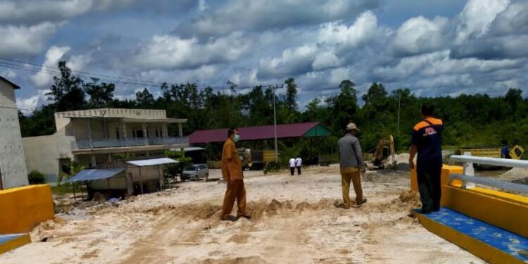 Jembatan Sei Pihan yang berada di Desa Tumbang Hakau, Kecamatan Kurun akhirnya rampung dikerjakan, belum lama ini. (Foto : BPBD Gumas)