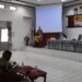 Asisten Perekonomian dan Pembangunan Kabupaten Gumas Richard membacakan sambutan tertulis Bupati Gumas Jaya S Monong saat pembukaan penyusunan Rancangan Peraturan Bupati tentang Perlindungan Perempuan dan Anak di aula Bappedalitbang setempat, Senin (1/3/2021).