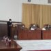 Anggota DPRD Gumas Untung J Bangas (kiri) membacakan keputusan DPRD Gumas tentang rekomendasi terhadap LKPJ Bupati tahun 2020, saat rapat paripurna di Kuala Kurun, Rabu (21/7/2021).