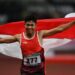 Arsip foto - Sprinter Indonesia Sapto Yogo Purnomo berlari sambil membawa bendera Merah-Putih usai menjuarai final 100 meter putra T37 Asian Para Games di Stadion Utama Gelora Bung Karno, Senayan, Jakarta, Selasa (9/10/2018). Sapto berhasil meraih medali emas dengan catatan waktu 11,49 detik. ANT/IST/Sigid Kurniawan/foc.