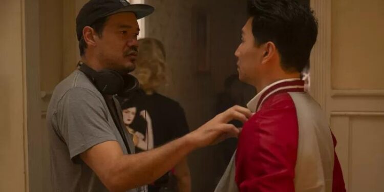 (L-R): Director Destin Daniel Cretton and Simu Liu on the set of Marvel Studios' "Shang-Chi and The Legend of The Ten Rings" (2021). (Marvel Studios/Jasin Boland/ANT)