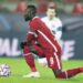 Gelandang Liverpool asal Guinea, Naby Keita, saat pertandingan Grup C Liga Champions melawan FC Midtjylland di Herning, Denmark, pada 9 Desember 2020. (AFP/HENNING BAGGER)