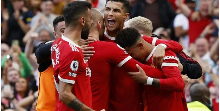 Pemain Manchester United merayakan gol kedua Cristiano Ronaldo saat melawan Newcastle United dalam laga Liga Inggris di Old Trafford, Manchester, Inggris, Sabtu (11/9/2021). Ronaldo mencetak dua gol dan MU menang 4-1. ANT/IST
