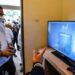 Menteri Pariwisata dan Ekonomi Kreatif Sandiaga Salahuddin Uno saat mencoba memainkan salah satu game lokal buatan anak bangsa. (MASAPNEWS/HO-Kemenparekraf)
