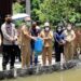 Bupati Gumas, Jaya S Monong, Wabup Efrensia L.P Umbing, dan lainnya menabur benih ikan di Desa Hurung Bunut, Kecamatan Kurun, Selasa (5/10/2021). (IST)