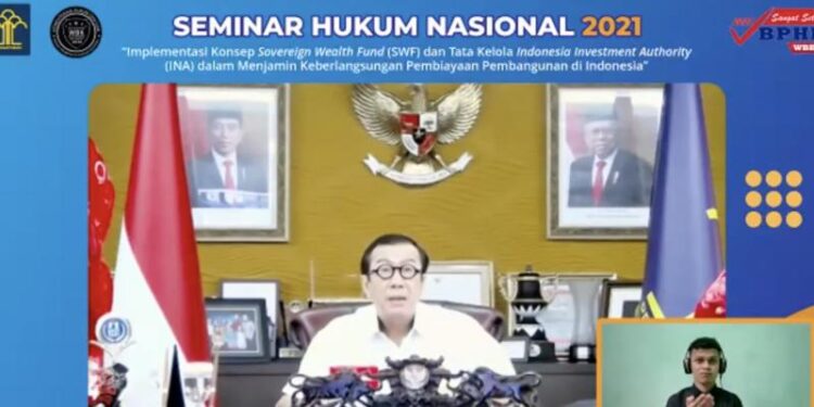 Menteri Hukum dan Hak Asasi Manusia (Menkumham) Yasonna Hamonangan Laoly memberikan paparan kunci dalam seminar bertajuk “Implementasi Konsep Sovereign Wealth Fund (SWF) dan Tata Kelola Indonesia Investment Authority (INA) dalam Menjamin Keberlangsungan Pembiayaan Pembangunan di Indonesia” yang disiarkan di kanal YouTube bphntv official, Rabu (6/10/2021). (MASAPNEWS/ANT/Tangkapan layar)