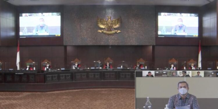 Direktur Jenderal Informasi dan Komunikasi Publik Kementerian Komunikasi dan Informatika, Usman Kansong, memberi keterangan sebagai Kuasa Presiden di Sidang Perkara Nomor 38/PUU-XIX/2021 yang disiarkan secara langsung di kanal YouTube Mahkamah Konstitusi, Senin (11/10/2021). (MASAPNEWS/ANT/Tangkapan layar)