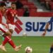 Dokumentasi - Pesepak bola Timnas Indonesia Rachmat Irianto (kiri) berebut bola dengan pesepak bola Timnas Singapura Hami Syahin (kanan) dalam pertandingan Semi Final Leg 2 Piala AFF 2020 di National Stadium, Singapura, Sabtu (25/12/2021). Indonesia melaju ke babak final usai melibas Singapura 4-2 (5-3). (MASAPNEWS/ANT/Humas PSSI/Handout)