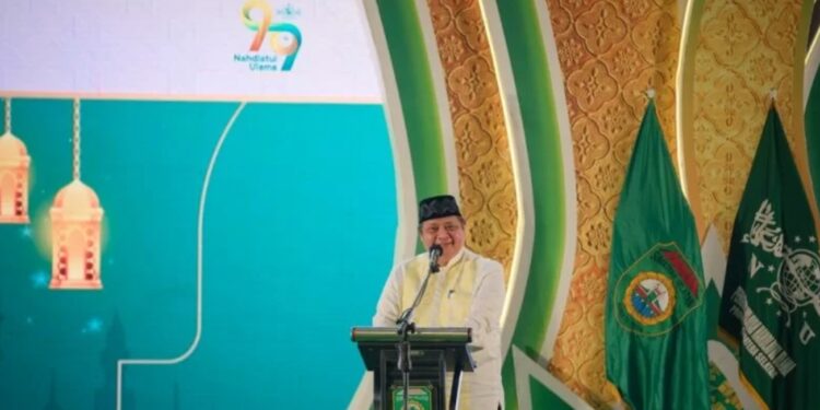 Menteri Koordinator Bidang Perekonomian Airlangga Hartarto saat memberikan sambutan pada acara Puncak Hari Lahir Nahdlatul Ulama (Harlah NU) ke-99 Wilayah Barat Indonesia di Jakabaring Sport City, Palembang, Jumat (4/3/2022). (MASAPNEWS/ANT/HO-Kemenko Perekonomian)