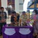 Bupati Gumas Jaya S Monong bersama Ketua MPH Sinode GKE Rony Karlos disaksikan Wabup Efrensia L.P Umbing serta Kepala DPU Baryen dan lainnya menandatangani prasasti Gereja Sakatik, Minggu (27/2/2022). (Foto : Diskominfosantik Gumas)