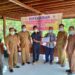 Suasana penyaluran BLT DD di Desa Batu Nyiwuh, Kecamatan Tewah, Kabupaten Gumas, Senin (28/3/2022). (Foto : DPMD Kabupaten Gumas)