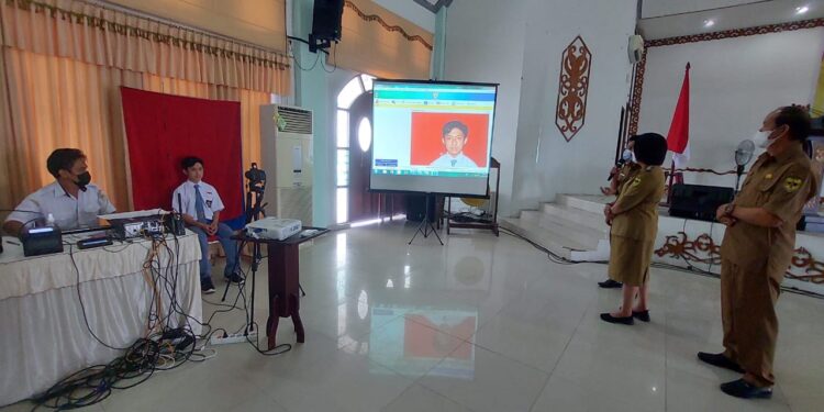 Suasana launching layanan Senyum Tabela di GPU Damang Batu Kuala Kurun, Senin (25/4/2022). (Foto : Diskominfosantik Kabupaten Gumas)
