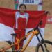 Tiara Andini Prastika menyumbang medali emas untuk Indonesia setelah finis tercepat 3 menit 31,531 detik pada cabang olahraga balap sepeda MTB-Downhill putri di Hoa Binh Gymnastics and Sports Center, Minggu (15/5/2022). (MASAPNEWS/ANT/HO-Nick Hanoatubun/PB ISSI)