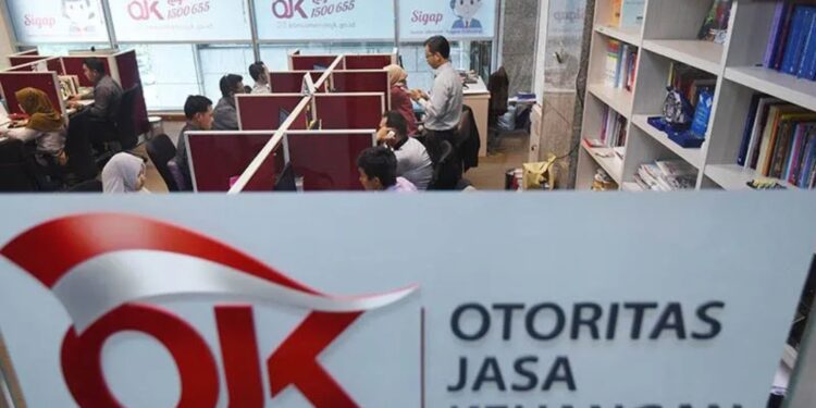 Ilustrasi - Petugas beraktivitas di ruang layanan Konsumen Otoritas Jasa Keuangan (OJK) di Jakarta. (MASAPNEWS/ANT)