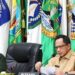 Menteri Dalam Negeri (Mendagri) Muhammad Tito Karnavian (kanan) saat memimpin Rapat Koordinasi (Rakor) Pengendalian Inflasi Daerah secara hibrid dari Gedung Sasana Bhakti Praja (SBP) Kantor Pusat Kementerian Dalam Negeri (Kemendagri), Jakarta, Senin (27/3/2023). (MASAPNEWS/ANT)