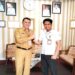 Pelaksana Harian Sekda Gunung Mas Richard (kiri) dan Kepala BPJS Kesehatan Gunung Mas Adi Suci Guntoro, berfoto bersama usai pertemuan koordinasi, di Kuala Kurun, Senin (10/4/2023). (IST)