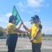 Wabup Gunung Mas Efrensia LP Umbing menyerahkan pataka kabupaten kepada Kepala Disbudpar Hansli Gonak, di Kuala Kurun, Jumat (19/5/2023). (MASAPNEWS/GCM)