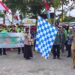 Wakil Bupati Gunung Mas Efrensia LP Umbing didampingi forkopimda dan lainnya melepas peserta pawai taaruf di Taman Kota Kuala Kurun, Senin (7/8/2023). (IST)