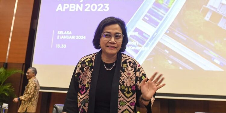 Menteri Keuangan Sri Mulyani bersiap memberikan keterangan kepada media hasil Kinerja dan Realisasi Anggaran Pendapatan dan Belanja Negara (APBN) 2023 di Kantor Kementerian Keuangan, Jakarta, Selasa (2/1/2024). (MASAPNEWS/ANT)