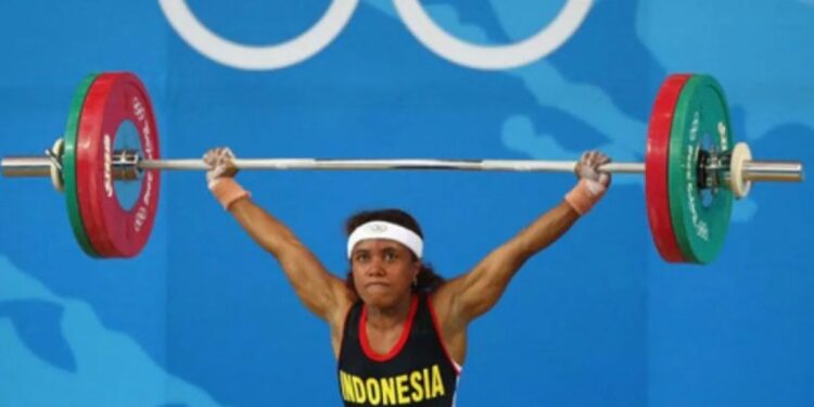 Arsip foto - Atlet angkat berat Papua Lisa Rumbewas saat tampil di ajang Olimpiade. ANTARA/HO-reprensi pihak ketiga/pri. (MASAPNEWS/ANT/HO-reprensi pihak ketiga)