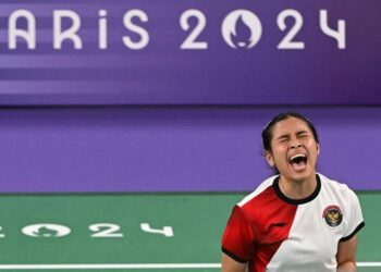 Ekspresi pebulu tangkis tunggal putri Indonesia Gregoria Mariska Tunjung usai meraih poin dari pebulu tangkis Thailand Ratchanok Intanon pada babak perempat final bulu tangkis tunggal putri Olimpiade Paris 2024 di Porte De La Chapella Arena, Paris, Prancis, Sabtu (3/8/2024). Gregoria berhasil melaju ke semifinal setelah mengalahkan Ratchanok Intanon dengan dua gim langsung 25-23, 21-9. (MASAPNEWS/ANT)