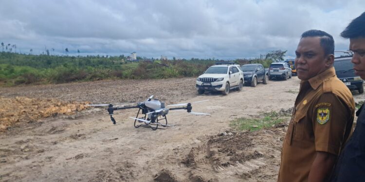 Demonstrasi penerbangan drone DJI Agras T40 di Desa Tanjung Riu Kecamatan Kurun, Selasa (21/1/2025). MASAPNEWS/GCM
