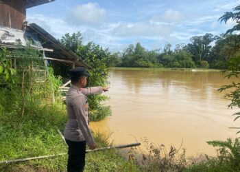 Antisipasi Banjir, Kapolres Gumas Perintahkan Jajaran Cek Debit Air Sungai Secara Berkala