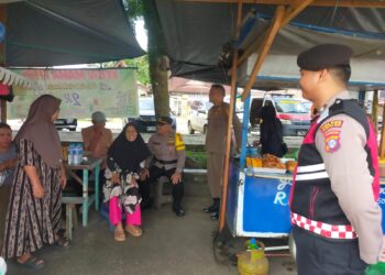 Polres Gunung Mas Gelar Patroli Dialogis, Sambangi Bank dan Sapa Warga di Taman Kota