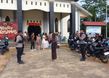 Polsek Manuhing Hadirkan Rasa Aman pada Ibadah Natal SPRP Talaken 1