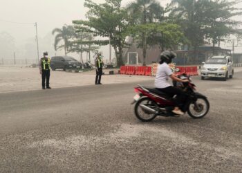Polres Gunung Mas Hadir di Titik Rawan, Pastikan Lalu Lintas Pagi Aman dan Lancar