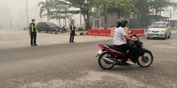 Polres Gunung Mas Hadir di Titik Rawan, Pastikan Lalu Lintas Pagi Aman dan Lancar